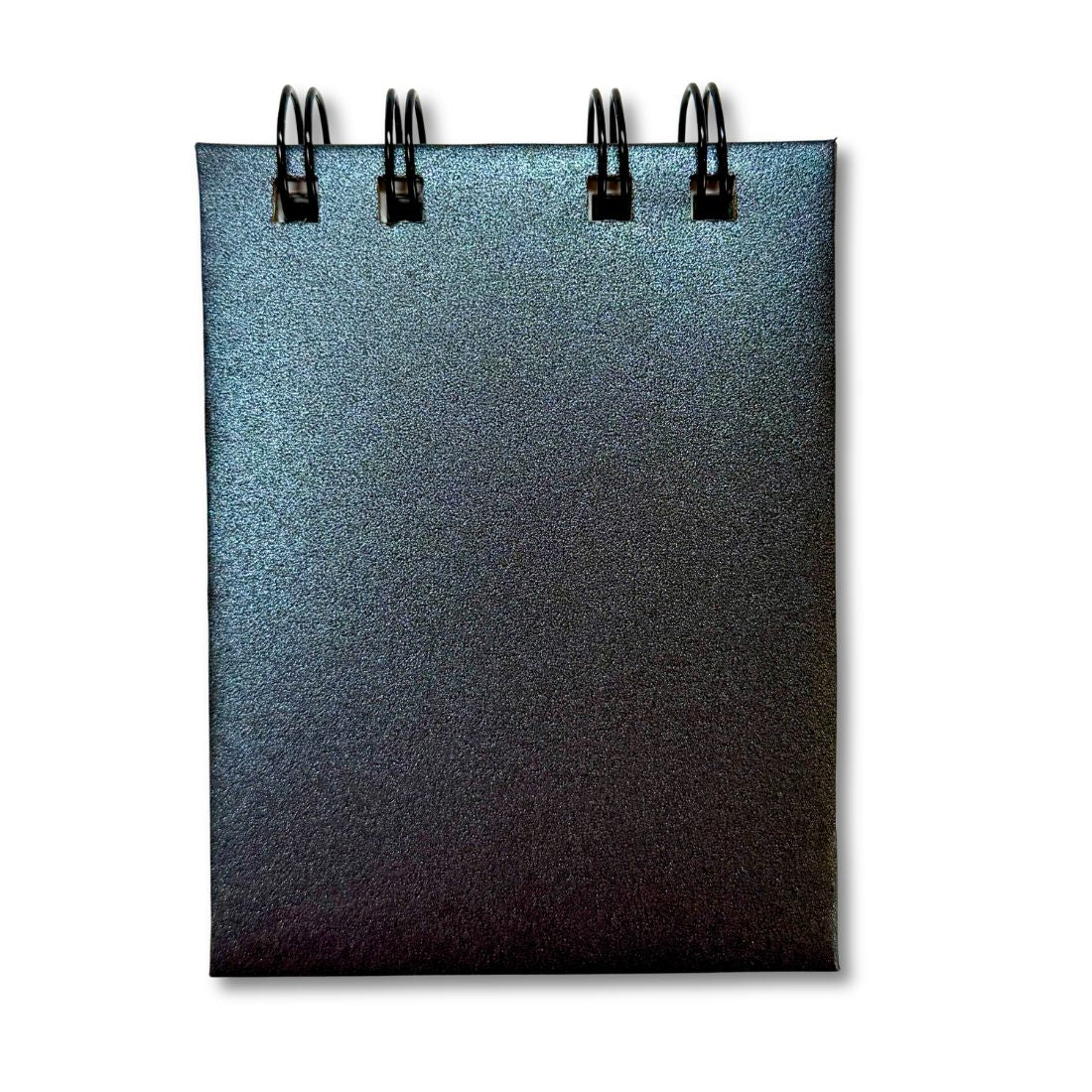 Black spiral-bound notebook on a white background