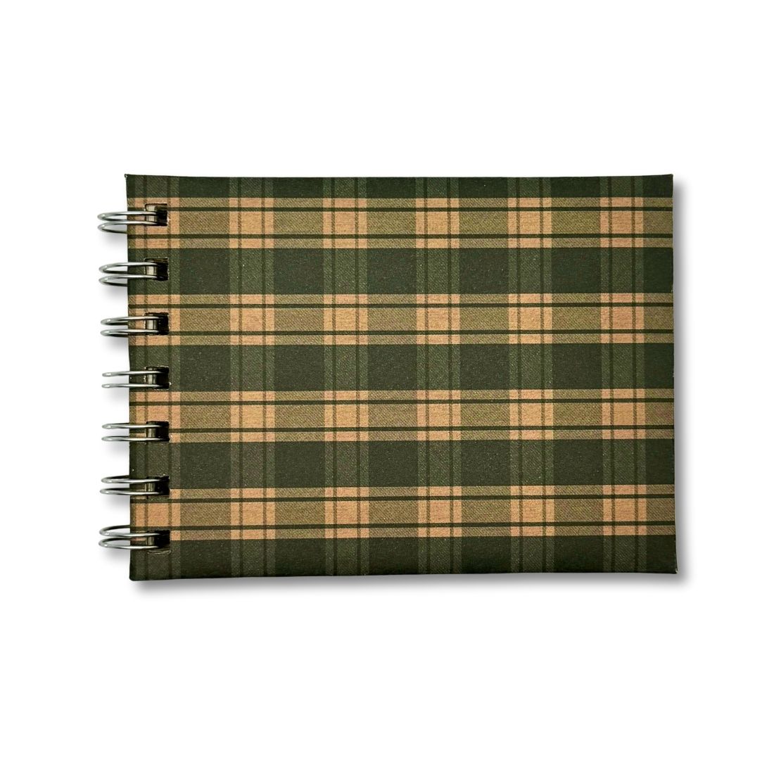 Plaid notebook with green and brown pattern on a white background
