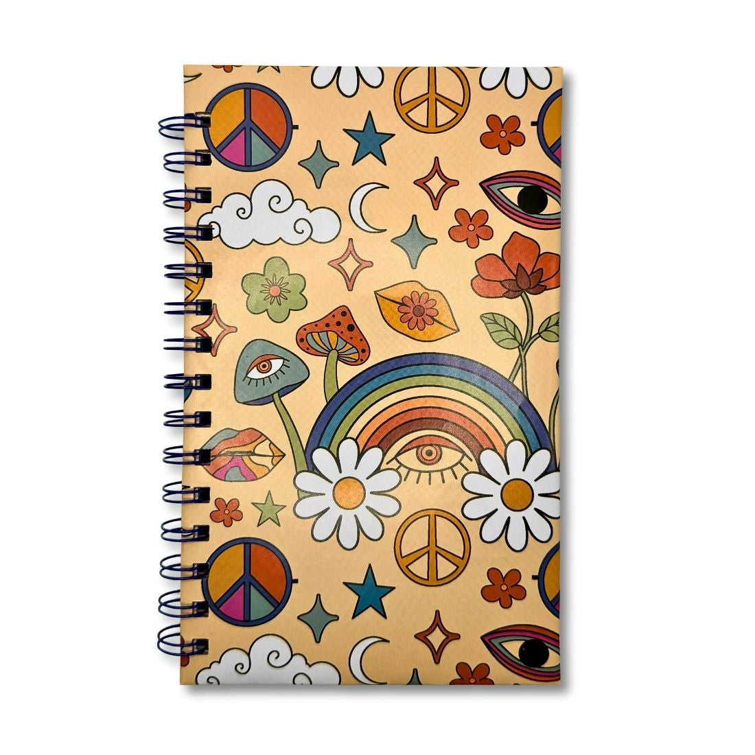 Notebook with retro design featuring peace signs, flowers, and rainbows on a beige background.