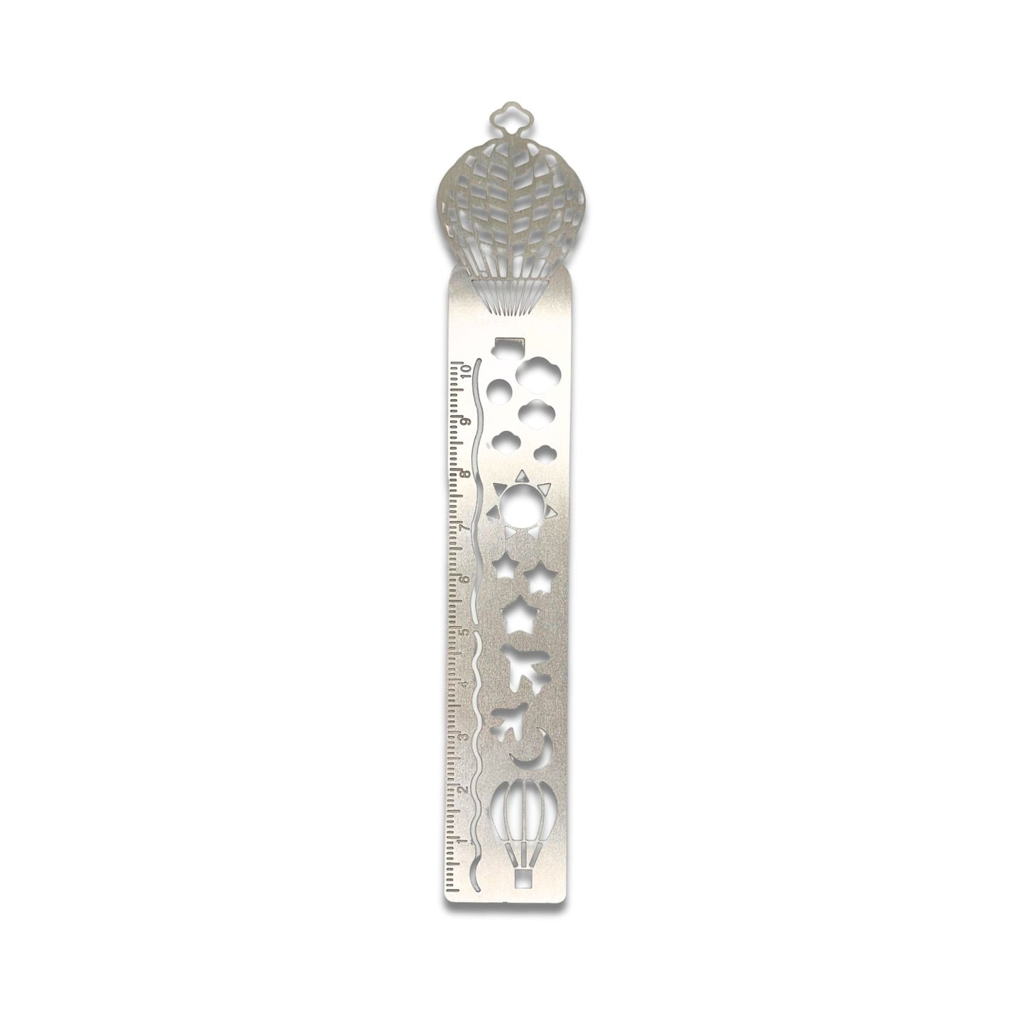 Metal hot air balloon bookmark/ruler with engraved designs on a white background