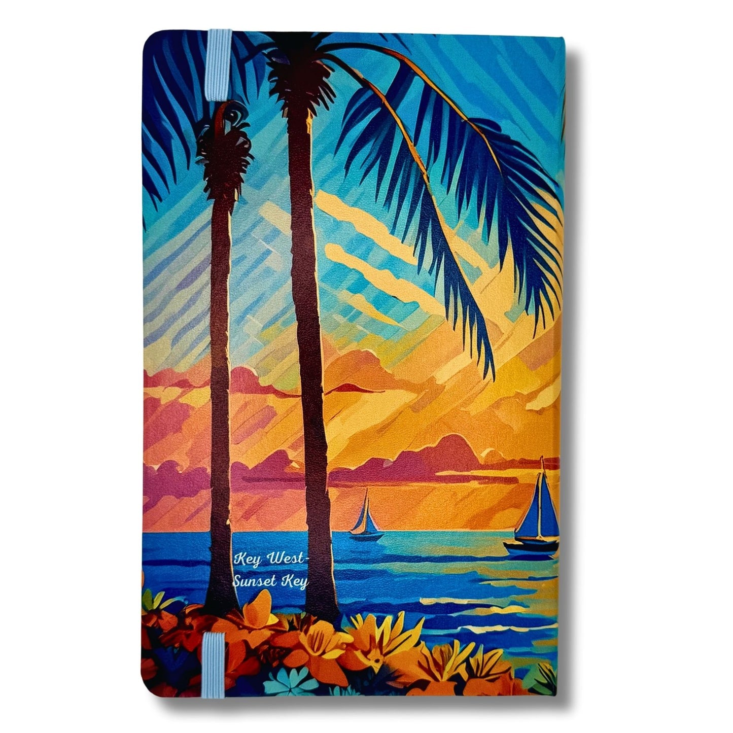 Colorful beach notebook with palm trees, sunset, and sailboats design.