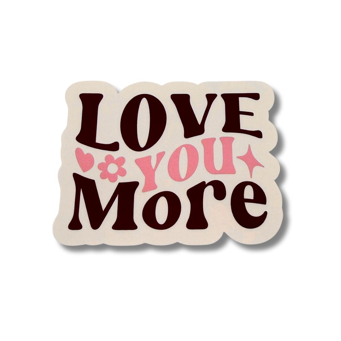 Decorative sticker with 'LOVE YOU MORE' text on a white background