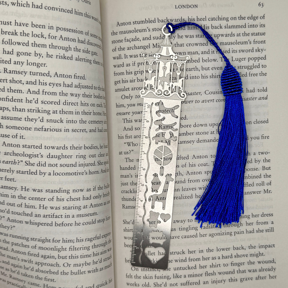 
                  
                    Merry Go Round Ruler Bookmark – Fun Aluminum Design with Blue Tassel
                  
                