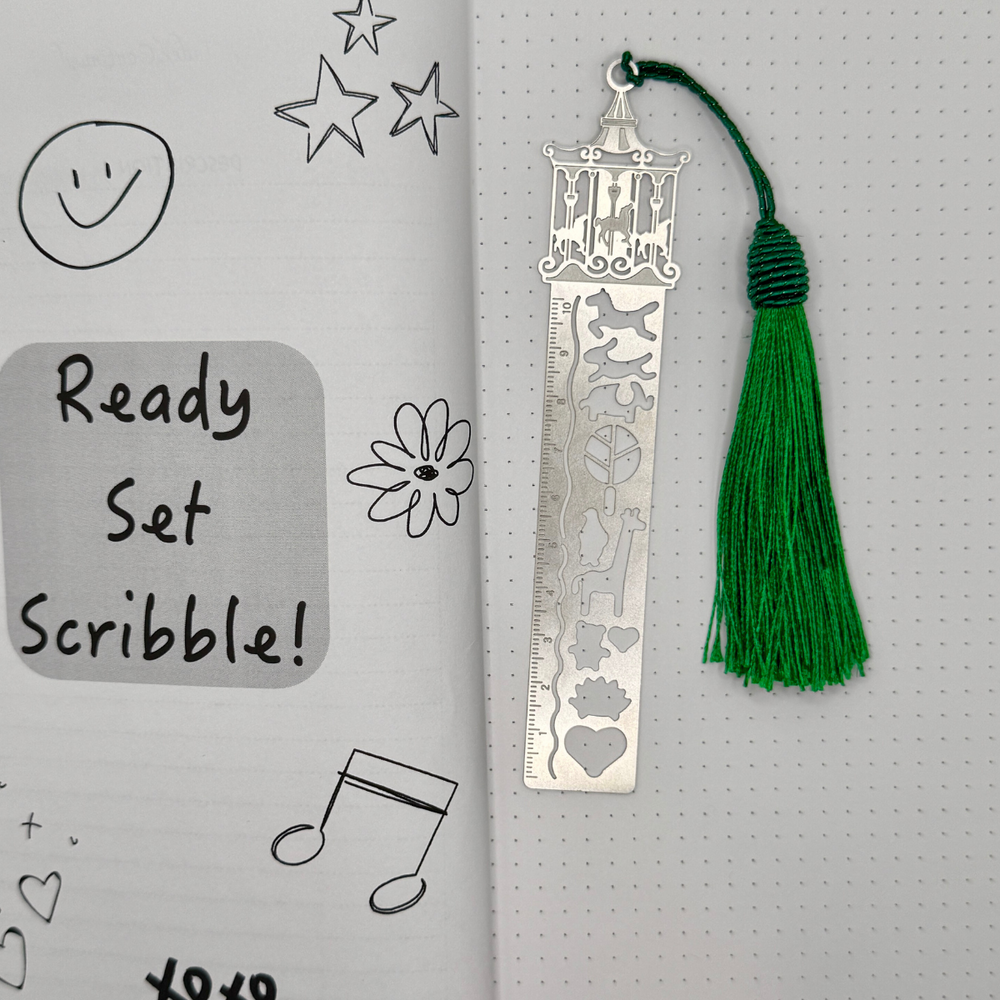 
                  
                    Merry Go Round Ruler Bookmark – Fun Aluminum Design with Green Tassel
                  
                