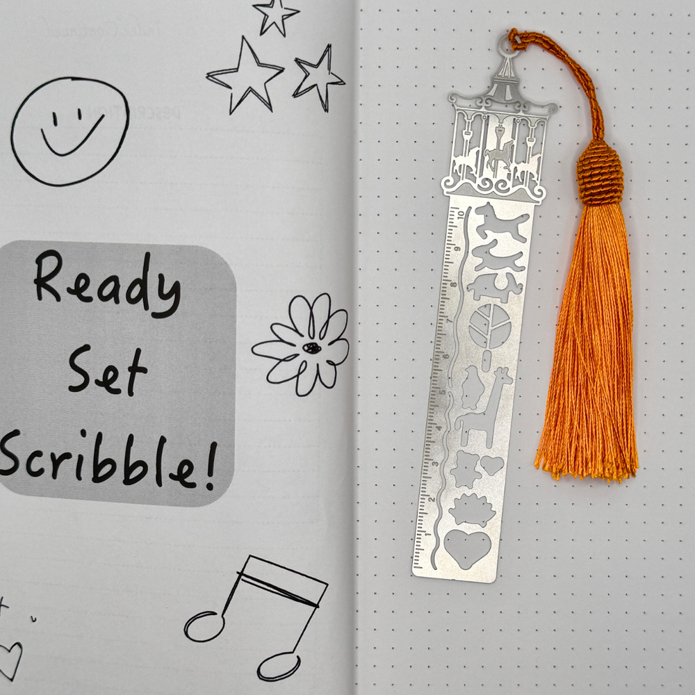 
                  
                    Merry Go Round Ruler Bookmark – Fun Aluminum Design with Orange Tassel
                  
                