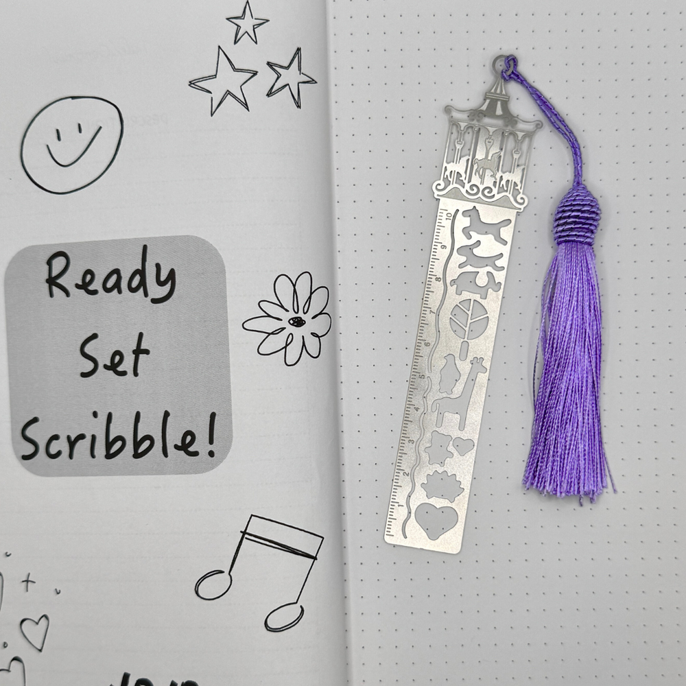 
                  
                    Merry Go Round Ruler Bookmark – Fun Aluminum Design with Purple Tassel
                  
                