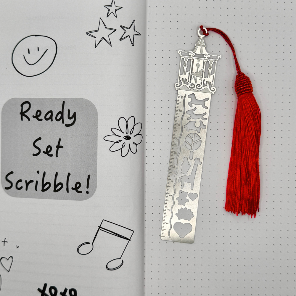 
                  
                    Merry Go Round Ruler Bookmark – Fun Aluminum Design with Red Tassel
                  
                