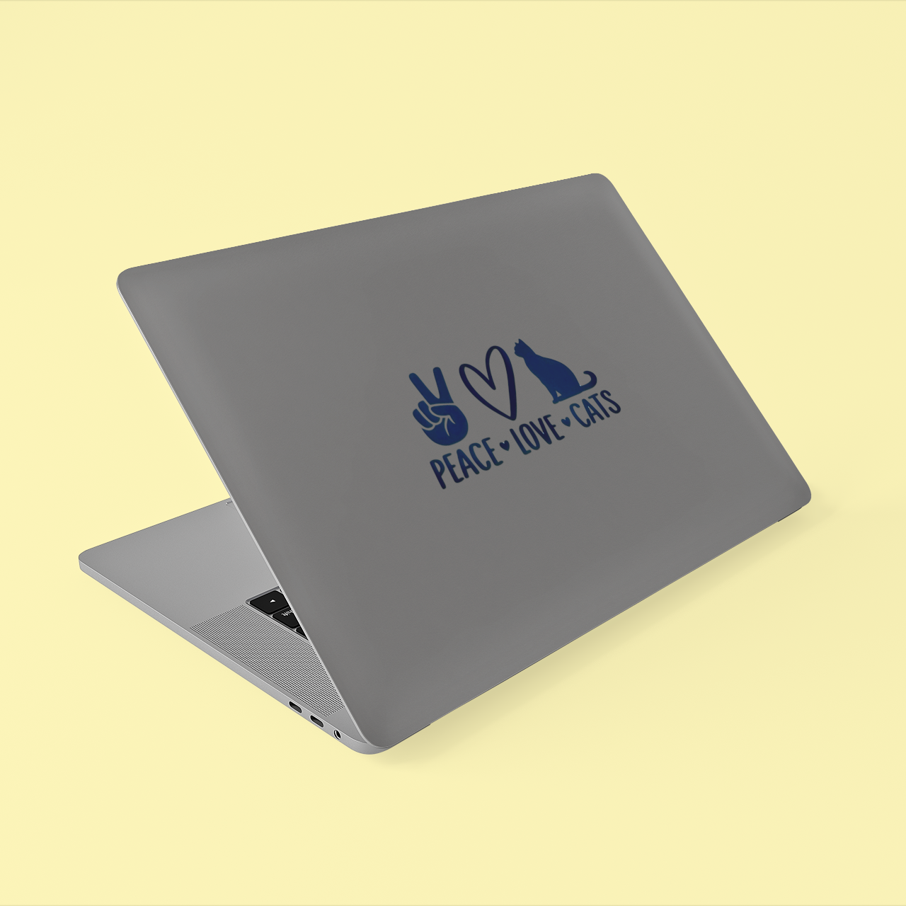 Blue Peace Love Cats sticker on a grey laptop