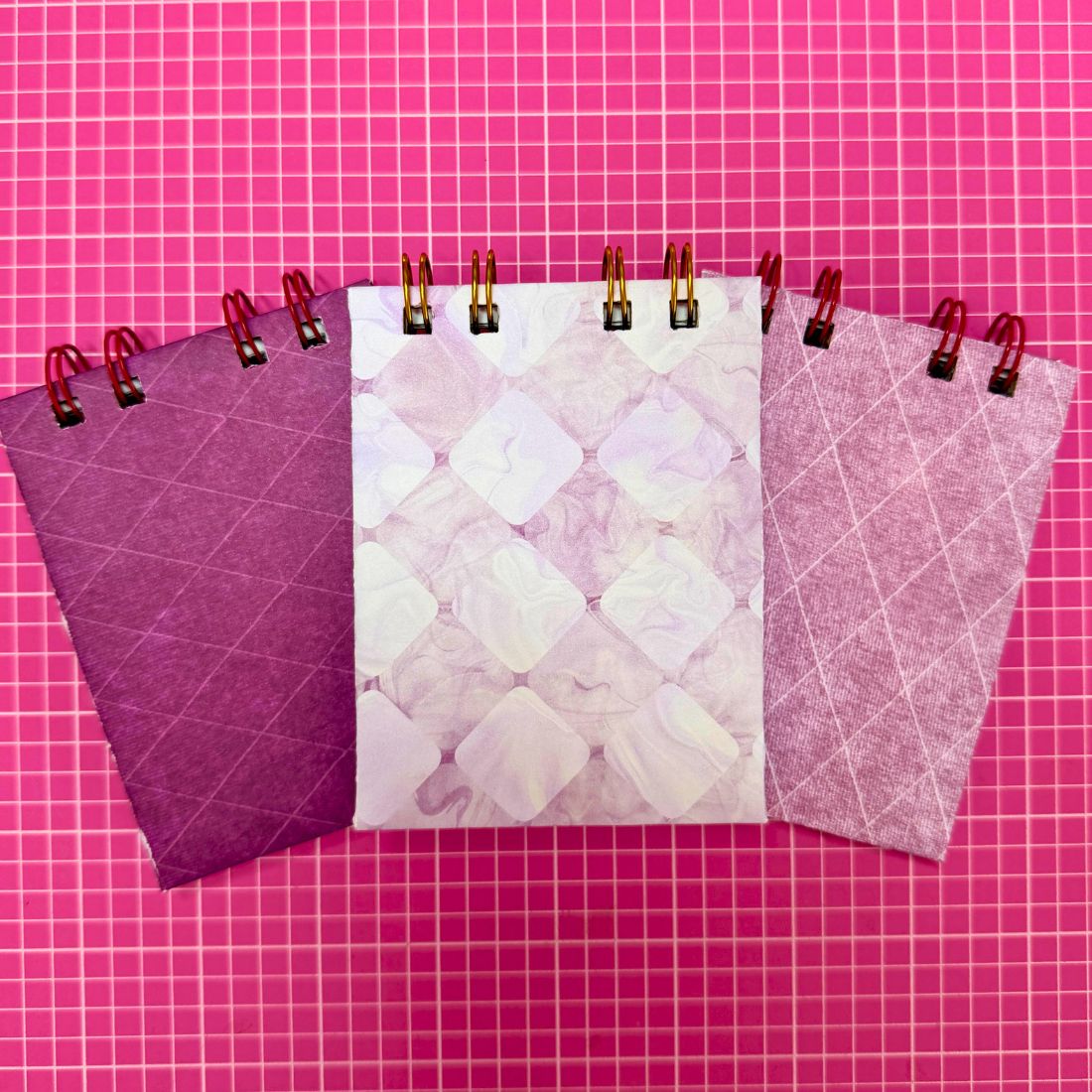 Purple extra mini notebook with spiral binding