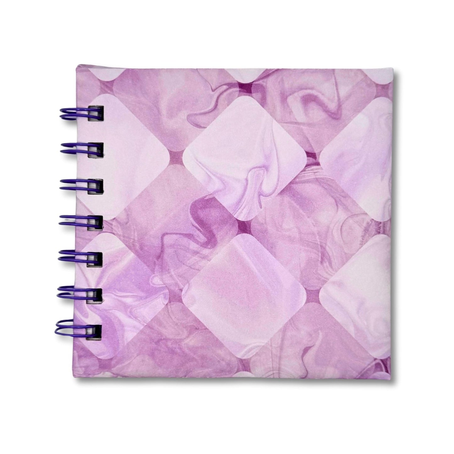 Notebook with a purple and white abstract design on a white background