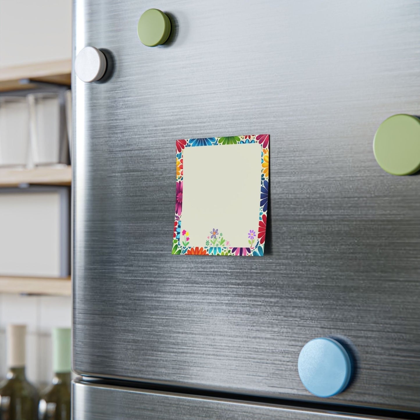 Floral design sticky note on a refrigerator with colorful magnets